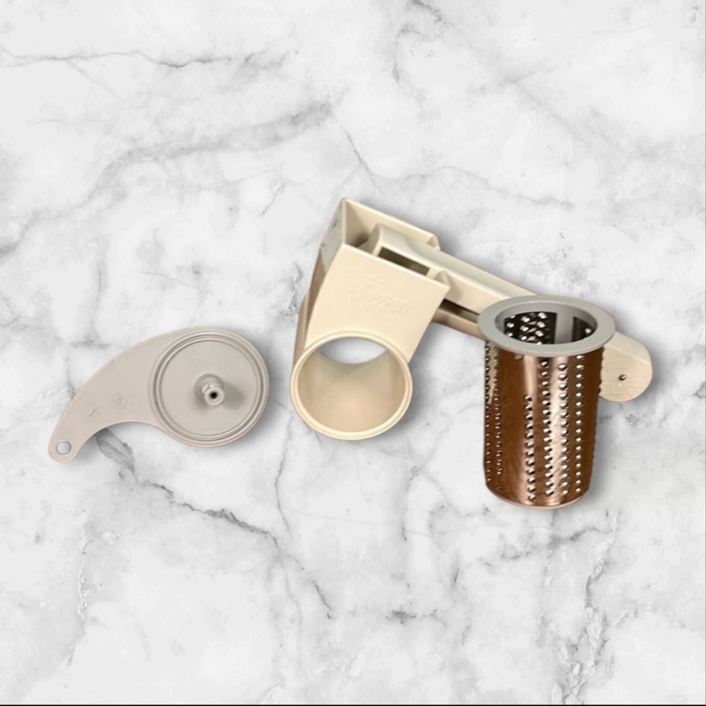 PAMPERED CHEF Deluxe Cheese grater, one barrel only for fine grated cheese.
